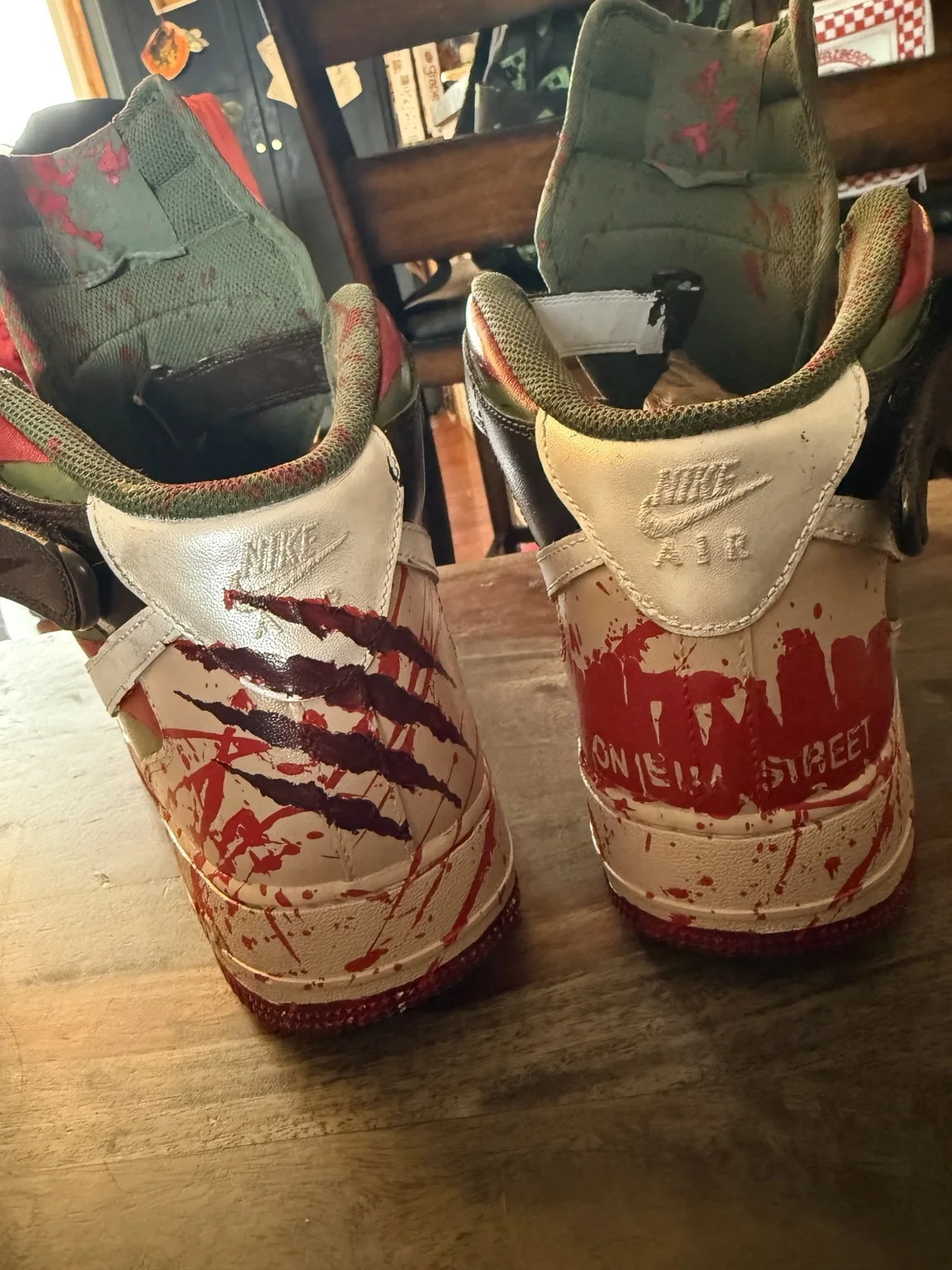 Custom heel artwork with claw marks and Elm Street theme