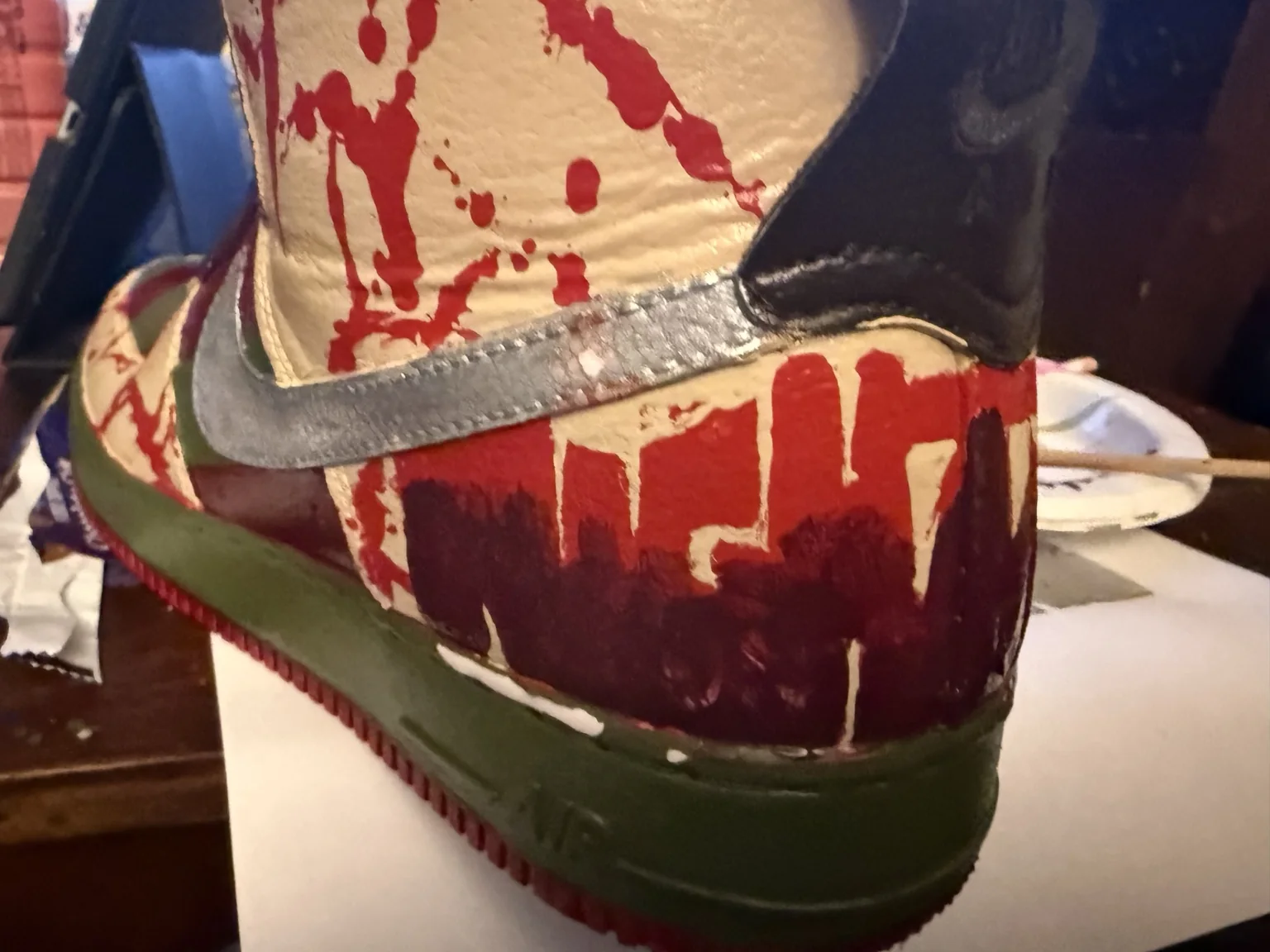 Side profile of hand-painted horror custom sneaker